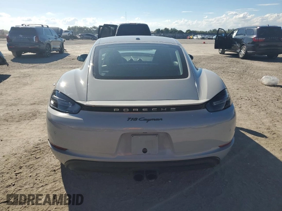 2024 Porsche 718 Cayman z VIN WP0AA2A82RK255106, wystawiony jako Copart lot #46917485 z przebiegiem 13 662 mil mil oraz Szkoda całkowita • Salvage title. Historia ofert i sprzedaży dostępna na DreamBid. Obrazek 6.