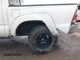 2014 Toyota Tacoma with VIN 3TMLU4EN8EM139665, listed as a IAAI auction lot 41925143 with 190,690 mi miles and . Bid and sale history available at DreamBid. Image 6.