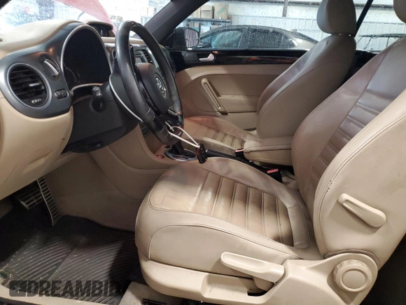 2015 Volkswagen Beetle with VIN 3VW7S7AT1FM822318, listed as a Copart auction lot 71398644 with 73,421 mi miles and Salvage Title. Bid and sale history available at DreamBid. Image 7.