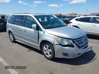 2011 Volkswagen Routan z VIN 2V4RW5DG1BR670701, wystawiony jako IAAI lot #42067249 z przebiegiem 211 632 mil mil oraz . Historia ofert i sprzedaży dostępna na DreamBid. Obrazek 1.