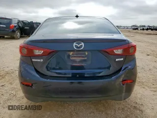 2015 Mazda 3 i Grand Touring with VIN 3MZBM1W77FM219595, listed as a Copart auction lot 61041105 with 140,846 mi miles and Salvage title. Bid and sale history available at DreamBid. Image 6.