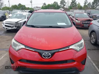2016 Toyota RAV4 LE z VIN JTMZFREV6GJ078639, wystawiony jako IAAI lot #41891971 z przebiegiem 154 929 mil mil oraz . Historia ofert i sprzedaży dostępna na DreamBid. Obrazek 12.