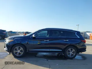 2020 Infiniti QX60 Pure with VIN 5N1DL0MN1LC506501, listed as a IAAI auction lot 41968177 with 53,128 mi miles and . Bid and sale history available at DreamBid. Image 14.