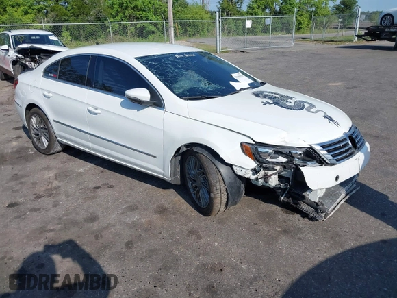 2015 Volkswagen CC R-Line with VIN WVWBN7AN3FE819870, listed as a IAAI auction lot 39390950 with 86,082 mi miles. Bid and sale history available at carsss.com. Image 1.