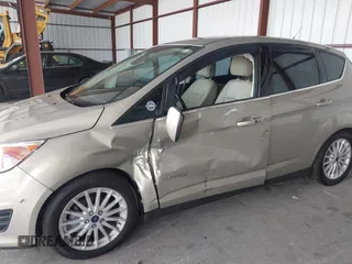 2016 Ford C-Max SEL z VIN 1FADP5BUXGL106531, wystawiony jako IAAI lot #42341433 z przebiegiem 74 854 mil mil oraz . Historia ofert i sprzedaży dostępna na DreamBid. Obrazek 6.