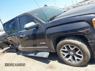 2015 GMC Sierra 1500 SLT with VIN 3GTU2VEC5FG457905, listed as a IAAI auction lot 42026975 with 160,637 mi miles and . Bid and sale history available at DreamBid. Image 14.