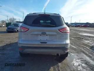 2013 Ford Escape SE with VIN 1FMCU9G98DUD51808, listed as a IAAI auction lot 41527022 with 141,471 mi miles. Bid and sale history available at carsss.com. Image 16.