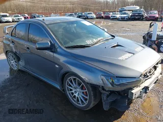 2008 Mitsubishi Lancer Evolution GSR with VIN JA3AW86V18U044077, listed as a IAAI auction lot 41208625 with 157,788 mi miles. Bid and sale history available at carsss.com. Image 17.
