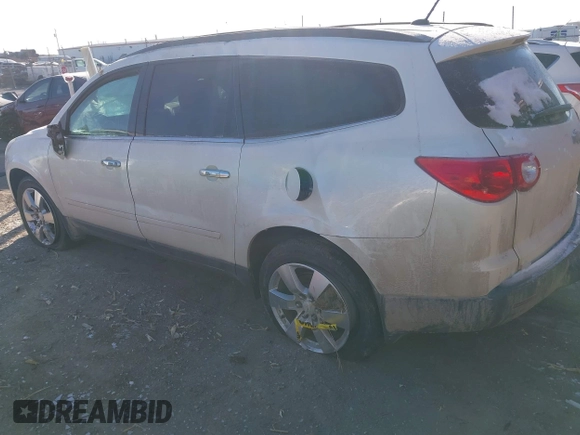 2012 Chevrolet Traverse 1LT with VIN 1GNKRGED4CJ323797, listed as a IAAI auction lot 41267339 with 142,463 mi miles and . Bid and sale history available at DreamBid. Image 3.