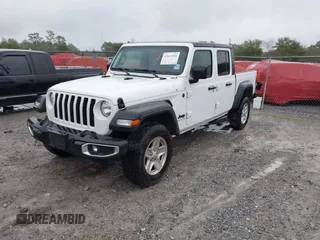 2023 Jeep Gladiator Sport S z VIN 1C6HJTAG5PL533877, wystawiony jako IAAI lot #41615284 z przebiegiem 41 191 mil mil oraz . Historia ofert i sprzedaży dostępna na DreamBid. Obrazek 2.