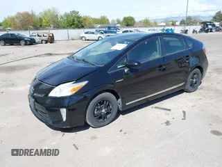 2013 Toyota Prius One with VIN JTDKN3DU9D1682269, listed as a IAAI auction lot 42100973 with 126,058 mi miles. Bid and sale history available at carsss.com. Image 2.