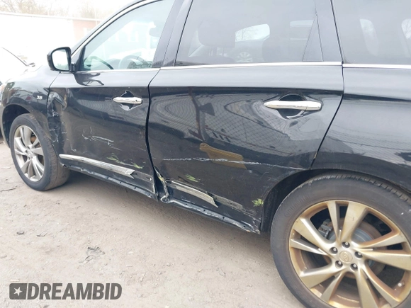 2015 Infiniti QX60 with VIN 5N1AL0MMXFC548440, listed as a IAAI auction lot 39273773 with 203,797 mi miles and . Bid and sale history available at DreamBid. Image 6.