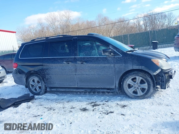 2008 Honda Odyssey Touring with VIN 5FNRL38948B029193, listed as a IAAI auction lot 41618424 with 219,964 mi miles. Bid and sale history available at carsss.com. Image 14.