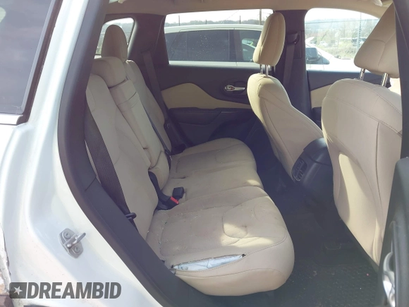 2016 Jeep Cherokee Latitude with VIN 1C4PJMCS1GW242545, listed as a IAAI auction lot 42048421 with 84,667 mi miles and . Bid and sale history available at carsss.com. Image 8.