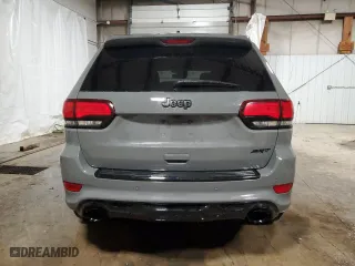 2021 Jeep Grand Cherokee SRT with VIN 1C4RJFDJ5MC667774, listed as a Copart auction lot 42484435 with 43,387 mi miles and Salvage Title. Bid and sale history available at carsss.com. Image 6.