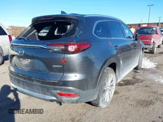 2023 Mazda CX-9 Signature z VIN JM3TCBEY1P0634465, wystawiony jako IAAI lot #41400230 z przebiegiem 42 166 mil mil oraz . Historia ofert i sprzedaży dostępna na DreamBid. Obrazek 4.