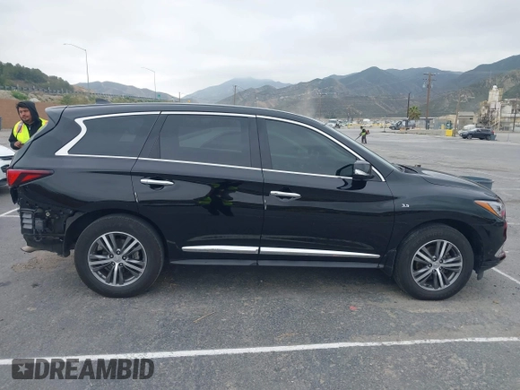 2020 Infiniti QX60 Luxe with VIN 5N1DL0MN2LC540608, listed as a IAAI auction lot 42187929 with 82,227 mi miles and . Bid and sale history available at DreamBid. Image 14.