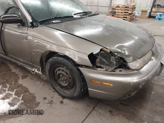 1998 Saturn SL z VIN 1G8ZH528XWZ240574, wystawiony jako IAAI lot #41588681 z przebiegiem Nie podano mil oraz . Historia ofert i sprzedaży dostępna na DreamBid. Obrazek 6.
