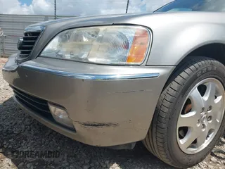 2002 Acura RL with VIN JH4KA96532C009398, listed as a IAAI auction lot 42688367 with 123,971 mi miles and . Bid and sale history available at DreamBid. Image 6.