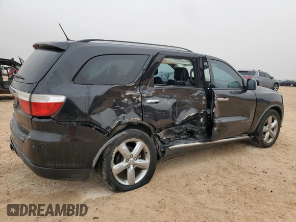 2012 Dodge Durango Citadel with VIN 1C4SDHET7CC180918, listed as a Copart auction lot 42714145 with 211,502 mi miles and Salvage title. Bid and sale history available at DreamBid. Image 3.