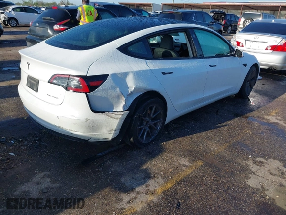 2023 Tesla Model 3 Long Range with VIN 5YJ3E1EB6PF633550, listed as a IAAI auction lot 41861278 with 45,743 mi miles and . Bid and sale history available at DreamBid. Image 4.