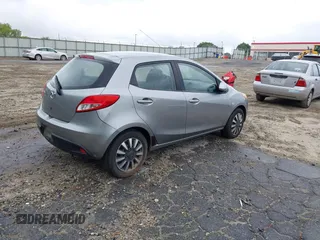 2013 Mazda 2 Sport with VIN JM1DE1KY9D0170519, listed as a IAAI auction lot 42212054 with 182,643 mi miles and . Bid and sale history available at DreamBid. Image 4.