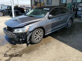 2017 Volkswagen Passat S with VIN 1VWAT7A3XHC024410, listed as a Copart auction lot 52186955 with 97,781 mi miles and Salvage title. Bid and sale history available at DreamBid. Image 1.