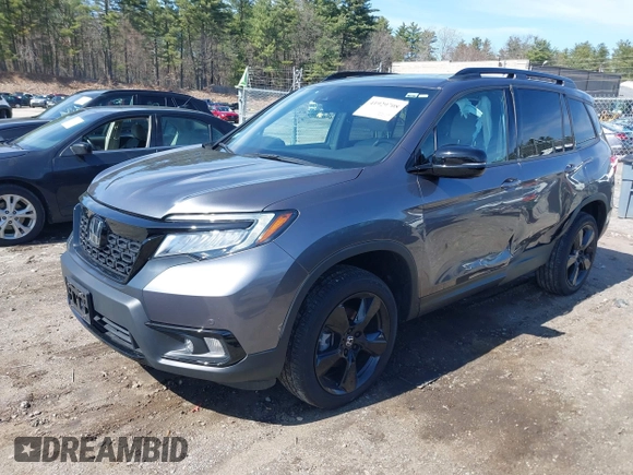 2021 Honda Passport Elite with VIN 5FNYF8H08MB011467, listed as a IAAI auction lot 41929708 with 34,106 mi miles. Bid and sale history available at carsss.com. Image 17.