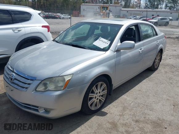 2005 Toyota Avalon XL with VIN 4T1BK36BX5U051434, listed as a IAAI auction lot 41914519 with 300,232 mi miles and . Bid and sale history available at DreamBid. Image 2.