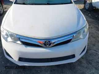 2012 Toyota Camry L with VIN 4T1BF1FK1CU561970, listed as a IAAI auction lot 41791136 with 113,261 mi miles. Bid and sale history available at carsss.com. Image 12.