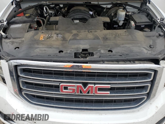 2020 GMC Yukon SLT with VIN 1GKS1BKC3LR168874, listed as a Copart auction lot 82103464 with 79,220 mi miles and Salvage Title. Bid and sale history available at DreamBid. Image 12.