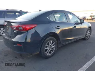2015 Mazda 3 i Grand Touring with VIN JM1BM1W71F1226283, listed as a IAAI auction lot 41450177 with 136,621 mi miles and . Bid and sale history available at DreamBid. Image 4.