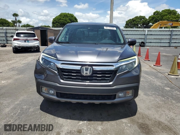 2017 Honda Ridgeline RTL-E with VIN 5FPYK3F74HB027130, listed as a Copart auction lot 60146905 with 99,964 mi miles and Salvage title. Bid and sale history available at DreamBid. Image 5.