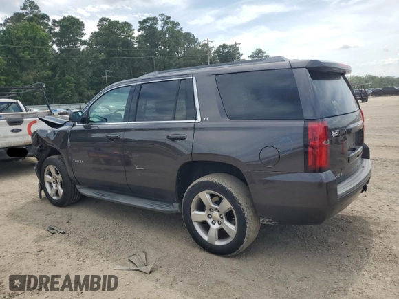 2015 Chevrolet Tahoe LT with VIN 1GNSCBKC1FR240186, listed as a Copart auction lot 64741425 with 110,357 mi miles and Salvage title. Bid and sale history available at DreamBid. Image 2.