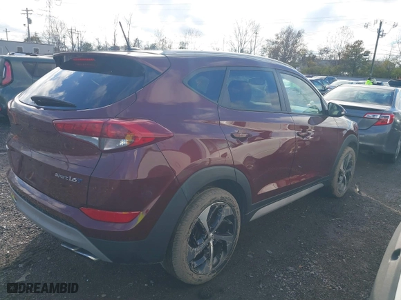 2017 Hyundai Tucson Value with VIN KM8J33A25HU530459, listed as a IAAI auction lot 40889753 with 62,223 mi miles. Bid and sale history available at carsss.com. Image 4.