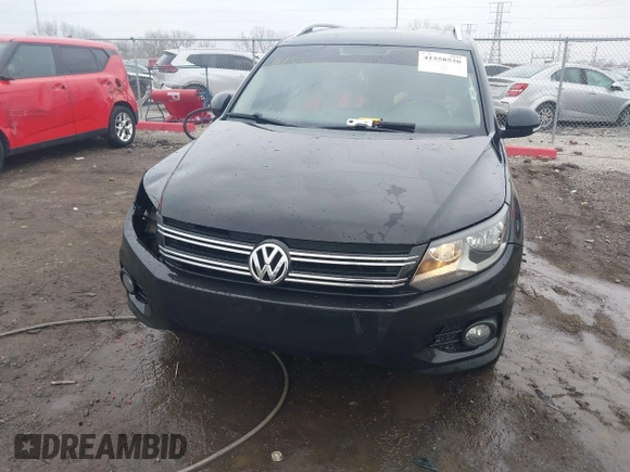 2012 Volkswagen Tiguan SE with VIN WVGAV7AX0CW602713, listed as a IAAI auction lot 41558520 with 95,678 mi miles and . Bid and sale history available at DreamBid. Image 12.