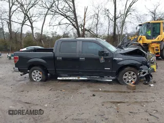 2011 Ford F-150 XLT with VIN 1FTFW1CT5BFB13799, listed as a IAAI auction lot 41426609 with 200,000 mi miles. Bid and sale history available at carsss.com. Image 12.