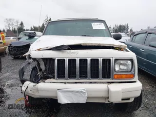 2000 Jeep Cherokee Classic with VIN 1J4FF58S4YL136213, listed as a IAAI auction lot 41227447 with 327,570 mi miles. Bid and sale history available at carsss.com. Image 12.