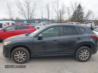 2015 Mazda CX-5 Touring with VIN JM3KE4CY1F0439016, listed as a IAAI auction lot 42039259 with 201,325 mi miles and . Bid and sale history available at carsss.com. Image 14.