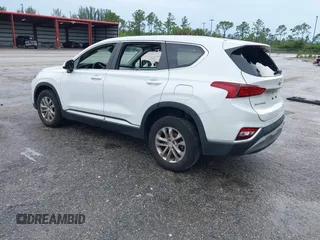 2019 Hyundai Santa Fe SE with VIN 5NMS23ADXKH038506, listed as a IAAI auction lot 42407399 with 54,540 mi miles and . Bid and sale history available at DreamBid. Image 3.