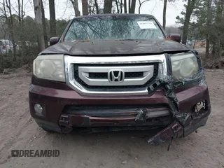 2010 Honda Pilot Touring with VIN 5FNYF4H9XAB040715, listed as a IAAI auction lot 41807334 with 262,786 mi miles and . Bid and sale history available at carsss.com. Image 6.