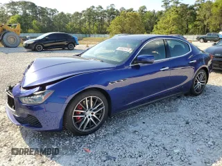 2015 Maserati Ghibli z VIN ZAM57XSA8F1153448, wystawiony jako Copart lot #50633475 z przebiegiem 59 020 mil mil oraz Szkody całkowita. Historia ofert i sprzedaży dostępna na DreamBid. Obrazek 1.