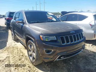 2014 Jeep Grand Cherokee Overland with VIN 1C4RJECG8EC409976, listed as a IAAI auction lot 41821685 with 186,105 mi miles. Bid and sale history available at carsss.com. Image 1.