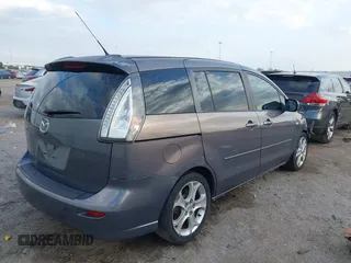 2009 Mazda 5 Sport with VIN JM1CR29L990341261, listed as a IAAI auction lot 41522567 with 123,465 mi miles and . Bid and sale history available at DreamBid. Image 4.
