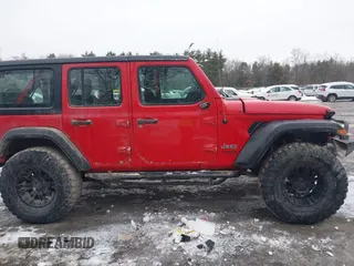 2018 Jeep Wrangler Unlimited Sport S with VIN 1C4HJXDG5JW131522, listed as a IAAI auction lot 41563099 with 75,405 mi miles and . Bid and sale history available at DreamBid. Image 12.