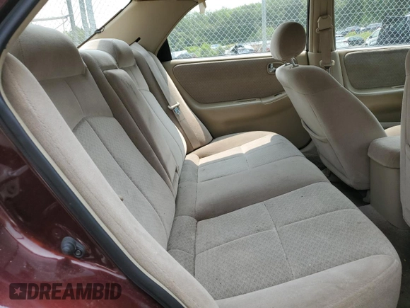 2000 Mazda 626 LX z VIN 1YVGF22C4Y5112874, wystawiony jako Copart lot #58952175 z przebiegiem 100 070 mil mil oraz Szkoda całkowita • Salvage title. Historia ofert i sprzedaży dostępna na DreamBid. Obrazek 10.