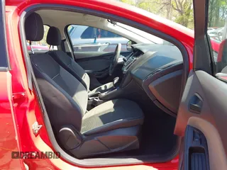 2012 Ford Focus SE z VIN 1FAHP3F23CL333598, wystawiony jako IAAI lot #41970172 z przebiegiem 209 969 mil mil oraz . Historia ofert i sprzedaży dostępna na DreamBid. Obrazek 5.