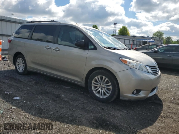 2015 Toyota Sienna XLE with VIN 5TDYK3DC7FS557268, listed as a Copart auction lot 55536475 with 80,791 mi miles and Clean title. Bid and sale history available at DreamBid. Image 4.