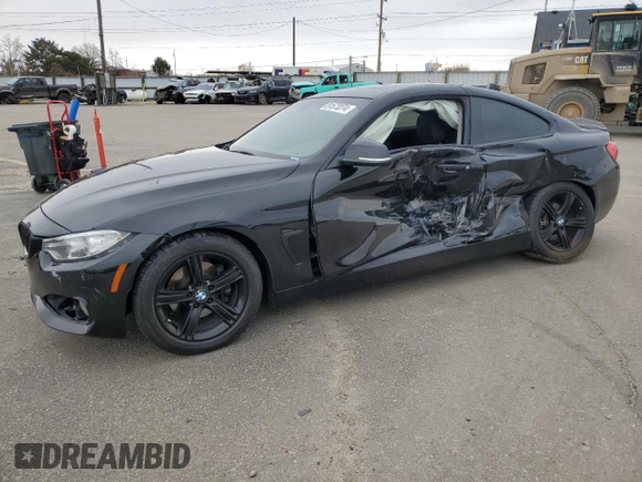 2014 BMW 4 Series 428i with VIN WBA3N7C58EF719741, listed as a Copart auction lot 81573274 with 113,095 mi miles and Salvage Title. Bid and sale history available at DreamBid. Image 1.