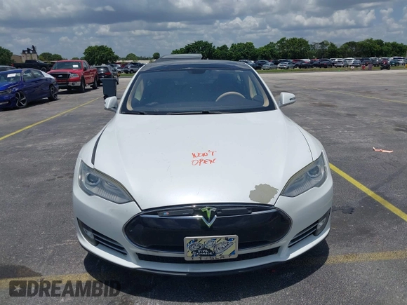 2013 Tesla Model S with VIN 5YJSA1CG4DFP21658, listed as a IAAI auction lot 42398609 with 116,068 mi miles and . Bid and sale history available at DreamBid. Image 12.